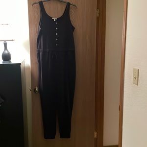 Gently used size L black romper.